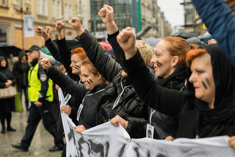 Slide 1 - Protests in Poland Call for New Abortion Laws (source_ Shutterstock)