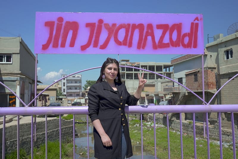 Women of Resilience follows two former Kurdish fighters as they leave armed resistance behind to pursue art and activism. Directed By Andreas Rochholl, Sebastian Leitner