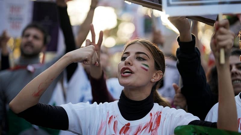 Iran’s “Women Revolution” in Quotes -Slide 5 (source_ AP Photo_Markus Schreiber)